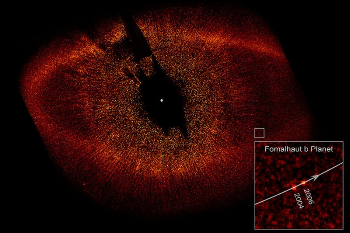 Coronagraphic image of the star Fomalhaut showing disk ring, colored red